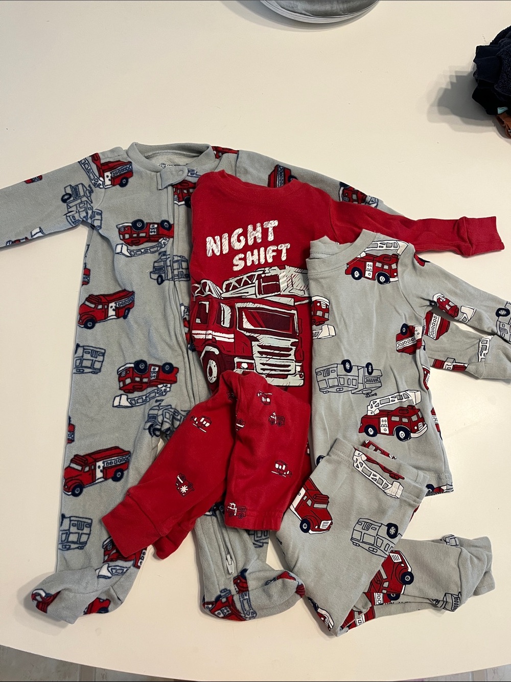 Carter’s fire truck pajama set (3 outfits)